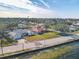 Aerial view of waterfront home with expansive backyard and private pool at 2425 Riverview Blvd, Bradenton, FL 34205