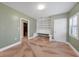 Bright bedroom with built-in shelving and window shutters at 2425 Riverview Blvd, Bradenton, FL 34205