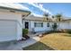 Front view of a house with a walkway to the entrance at 2425 Riverview Blvd, Bradenton, FL 34205