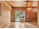 Indoor patio with wood paneling and pool access at 2425 Riverview Blvd, Bradenton, FL 34205