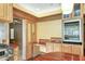 Kitchen features built-in wine cooler and wet bar at 2425 Riverview Blvd, Bradenton, FL 34205
