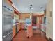 Modern kitchen with island and stainless steel appliances at 2425 Riverview Blvd, Bradenton, FL 34205