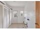 Laundry room with white closets and exterior access at 2425 Riverview Blvd, Bradenton, FL 34205