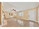Bright living room features a fireplace and built-in shelving at 2425 Riverview Blvd, Bradenton, FL 34205