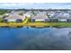 Aerial view of homes with lakefront access at 2616 Sapphire Blue Ln, Bradenton, FL 34211