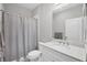 Simple bathroom with shower/tub combo and white vanity at 2616 Sapphire Blue Ln, Bradenton, FL 34211