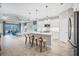 Modern kitchen with white cabinets, stainless steel appliances, and island at 2616 Sapphire Blue Ln, Bradenton, FL 34211