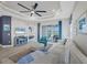 Living room with view of patio and water feature at 2616 Sapphire Blue Ln, Bradenton, FL 34211