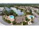 Aerial view of community pool and clubhouse at 2744 Hidden Lake Blvd # A, Sarasota, FL 34237