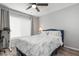 Bright bedroom with a queen bed and ceiling fan at 2744 Hidden Lake Blvd # A, Sarasota, FL 34237