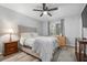 Bedroom with queen bed and ceiling fan at 2744 Hidden Lake Blvd # A, Sarasota, FL 34237