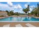 Inviting community pool with lounge chairs at 2744 Hidden Lake Blvd # A, Sarasota, FL 34237