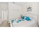 Guest bedroom with double bed, dresser, and large closet at 2763 Phoenix Palm Ter, North Port, FL 34288