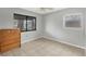 Bedroom with tile floors and dresser at 3307 20Th W Ave, Bradenton, FL 34205