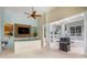 Outdoor kitchen area with a grill and bar at 3430 77Th W St # 102, Bradenton, FL 34209