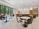 Relaxing community room with tables and chairs at 3484 Hadfield Greene # 22, Sarasota, FL 34235