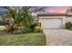 Well-maintained home with attractive landscaping and a two-car garage at 3484 Hadfield Greene # 22, Sarasota, FL 34235