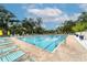 Resort-style pool with plenty of lounge chairs at 3484 Hadfield Greene # 22, Sarasota, FL 34235