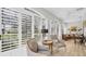 Bright sunroom with plenty of natural light and comfortable seating at 3484 Hadfield Greene # 22, Sarasota, FL 34235
