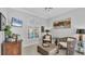Relaxing sunroom with comfortable seating and large windows at 3484 Hadfield Greene # 22, Sarasota, FL 34235