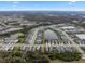 Aerial view of neighborhood with pond at 3543 Woodmont Dr, Parrish, FL 34219
