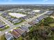 Aerial view of a house in a residential neighborhood at 3543 Woodmont Dr, Parrish, FL 34219