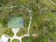 Community basketball court and surrounding landscape, seen from above at 3543 Woodmont Dr, Parrish, FL 34219