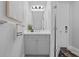 Clean and modern powder room with vanity and updated fixtures at 3543 Woodmont Dr, Parrish, FL 34219