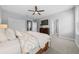 Calm bedroom with a ceiling fan and dresser at 3543 Woodmont Dr, Parrish, FL 34219
