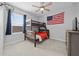 ' bedroom with bunk beds and American flag at 3543 Woodmont Dr, Parrish, FL 34219