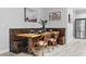 Charming built-in dining nook with wooden table and chairs at 3543 Woodmont Dr, Parrish, FL 34219