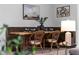 Rustic wooden dining nook with four chairs at 3543 Woodmont Dr, Parrish, FL 34219