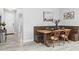 Built-in wooden dining nook with seating for four at 3543 Woodmont Dr, Parrish, FL 34219