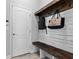 Convenient drop zone with built-in bench and storage at 3543 Woodmont Dr, Parrish, FL 34219