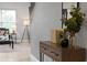 Console table with decor in a bright entryway at 3543 Woodmont Dr, Parrish, FL 34219