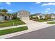 Two-story house with attached garage and landscaping at 3543 Woodmont Dr, Parrish, FL 34219