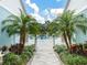White gate leading to the community pool area at 3543 Woodmont Dr, Parrish, FL 34219