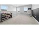 Playroom with chalkboard wall and built-in shelving at 3543 Woodmont Dr, Parrish, FL 34219