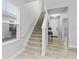 Bright entryway with staircase and tile flooring at 3543 Woodmont Dr, Parrish, FL 34219
