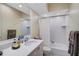 Clean bathroom with white vanity, tub, and shower at 370 Sugar Mill Dr, Osprey, FL 34229