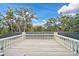 Spacious balcony overlooking lush landscape at 370 Sugar Mill Dr, Osprey, FL 34229