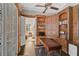 Home office with wooden built-ins and view to sitting area at 370 Sugar Mill Dr, Osprey, FL 34229