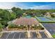 Community clubhouse with pool, tennis courts, and parking at 390 301 W Blvd # 8C, Bradenton, FL 34205