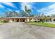 House exterior with driveway and carport at 390 301 W Blvd # 8C, Bradenton, FL 34205