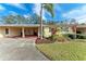 Front view of a single story home with carport at 390 301 W Blvd # 8C, Bradenton, FL 34205