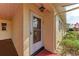 Front entrance with glass door and sidelight at 390 301 W Blvd # 8C, Bradenton, FL 34205