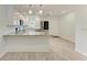 Modern kitchen with granite countertop and island at 390 301 W Blvd # 8C, Bradenton, FL 34205