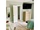Bedroom with large dresser and TV at 3907 10Th Avenue W Dr, Bradenton, FL 34205