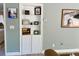 White built-in shelves with framed photos and decor at 3907 10Th Avenue W Dr, Bradenton, FL 34205