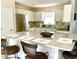 Kitchen island with seating for three at 3907 10Th Avenue W Dr, Bradenton, FL 34205